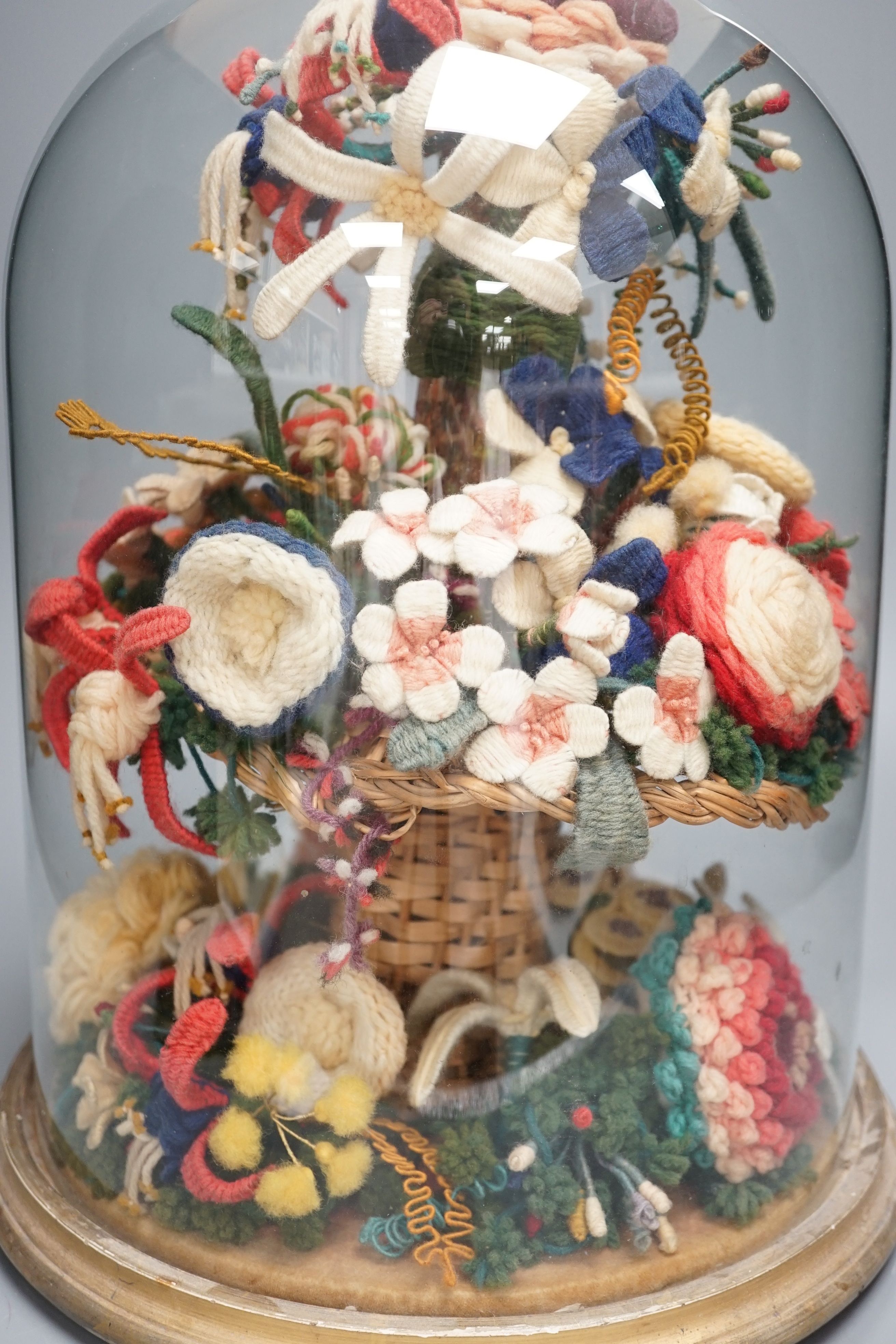 Victorian woolwork model of a bouquet of flowers under a glass dome - 40cm high